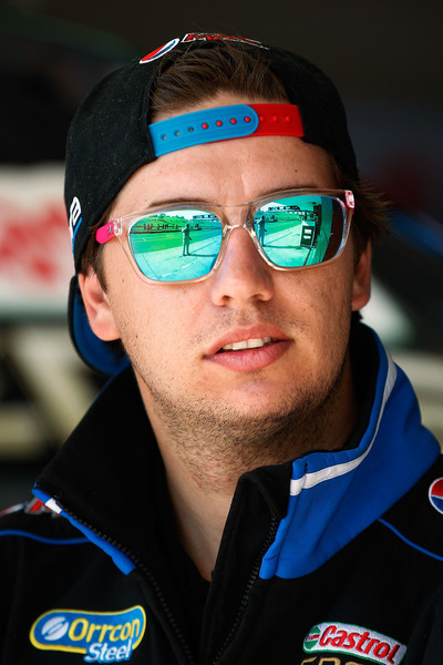 Mostert relishes wet weather to win from Coulthard